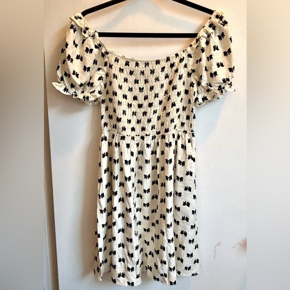 Cream Ruffled Off-Shoulder Dress with Black Bow Design - Picture 4 of 7